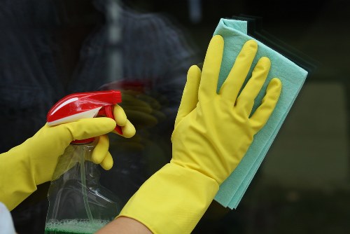 Professional Airbnb cleaner preparing a Kennington short-let property for guest arrival