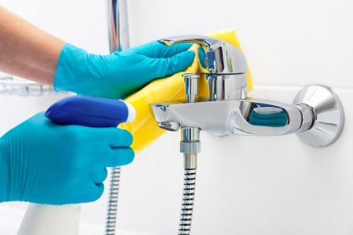 Cleaner using protective equipment during a risk-aware task